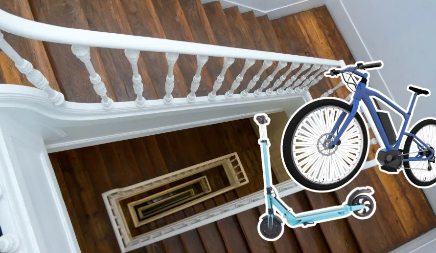 A bicycle is stored in the stairwell.